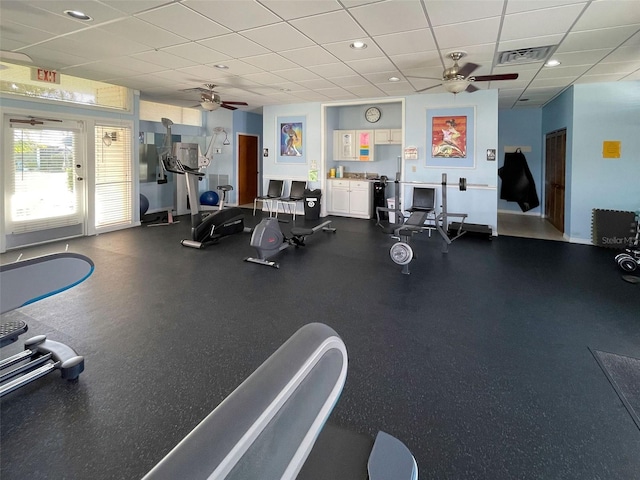 3141 Heron Shores Dr, Venice, FL 34293 - gym featuring ceiling fan and a drop ceiling