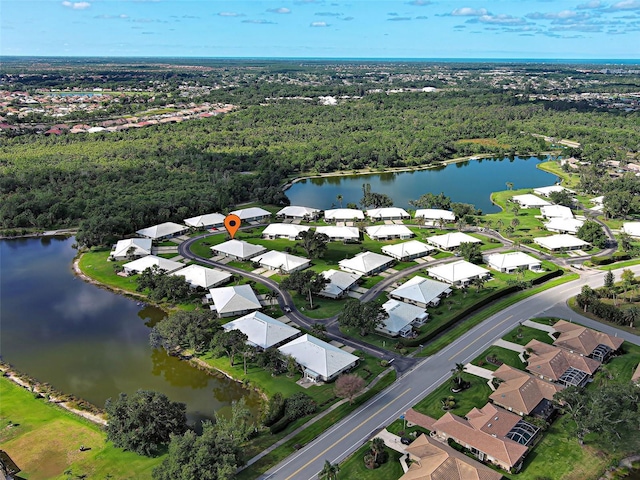 3141 Heron Shores Dr, Venice, FL 34293 - aerial view of property and surrounding area featuring a heavily wooded area and nearby suburban area