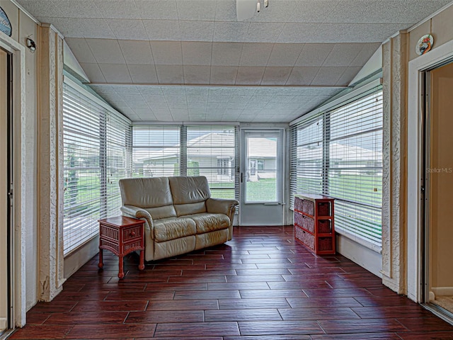 3141 Heron Shores Dr, Venice, FL 34293 - sunroom / solarium featuring wood finish floors, lofted ceiling, and plenty of natural light