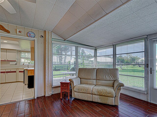 3141 Heron Shores Dr, Venice, FL 34293 - sunroom featuring wood finished floors and vaulted ceiling