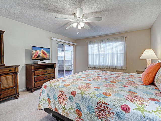 3141 Heron Shores Dr, Venice, FL 34293 - carpeted bedroom with ceiling fan and a textured ceiling