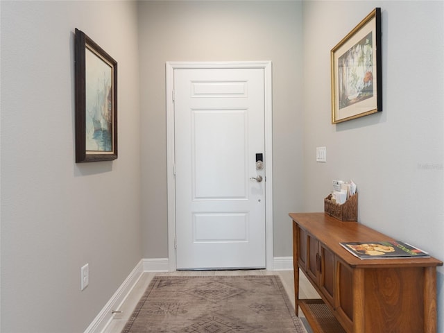 249 Tracino Ter, Nokomis, FL 34275 - entryway featuring baseboards