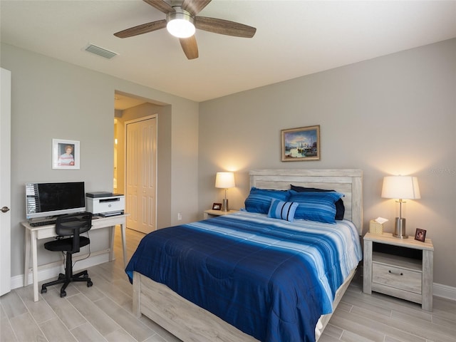 249 Tracino Ter, Nokomis, FL 34275 - bedroom featuring wood finish floors, baseboards, a desk, a closet, and ceiling fan