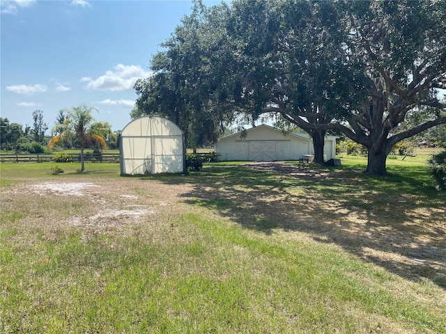 5760 Howard Creek Rd, Sarasota, FL 34241 - view of yard with an outbuilding and a barn