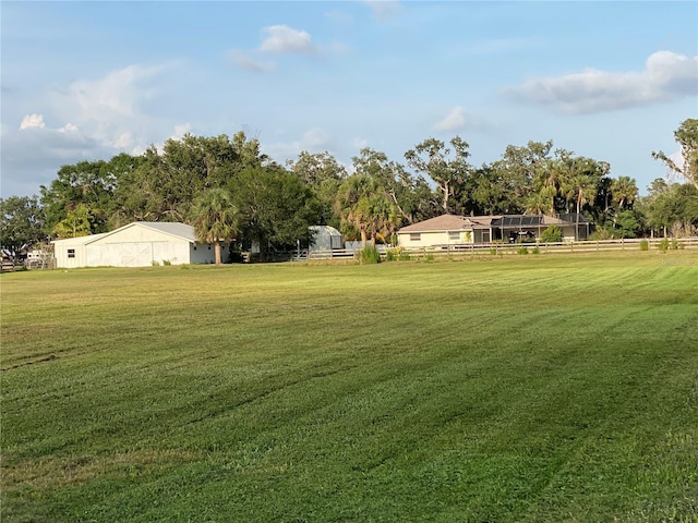 5760 Howard Creek Rd, Sarasota, FL 34241 - view of yard featuring view of wooded area