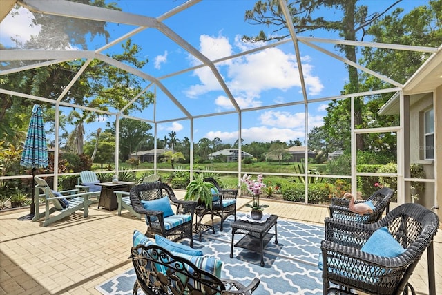 427 Autumn Chase Dr, Venice, FL 34292 - view of patio with an outdoor living space with a fire pit and a lanai