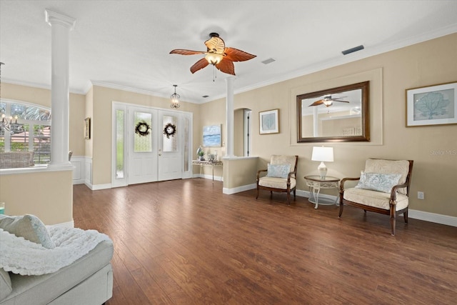 427 Autumn Chase Dr, Venice, FL 34292 - foyer entrance featuring ceiling fan, wood finished floors, decorative columns, and crown molding
