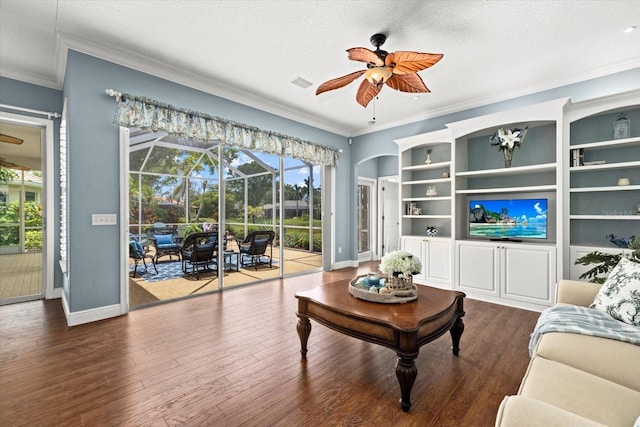 427 Autumn Chase Dr, Venice, FL 34292 - living room featuring ceiling fan, crown molding, baseboards, dark wood finished floors, and a sunroom