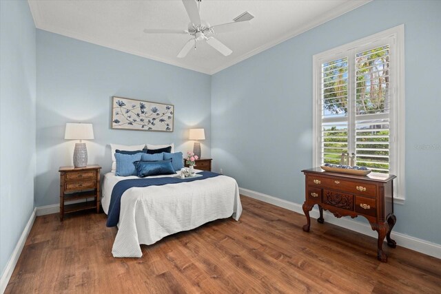 427 Autumn Chase Dr, Venice, FL 34292 - bedroom featuring ornamental molding, wood finished floors, baseboards, and a ceiling fan