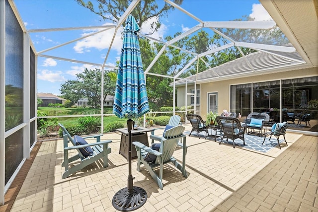 427 Autumn Chase Dr, Venice, FL 34292 - view of patio with glass enclosure and an outdoor living space