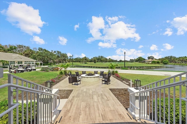 427 Autumn Chase Dr, Venice, FL 34292 - view of home's community with a fire pit, a water view, and a yard