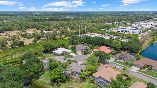 427 Autumn Chase Dr, Venice, FL 34292 - aerial view of residential area with a forest and a nearby body of water