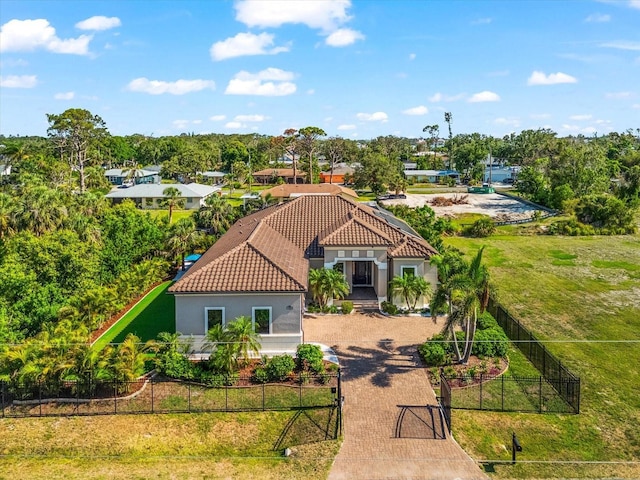 329 Myrtle Ave, Nokomis, FL 34275 - view of subject property with a tree filled landscape