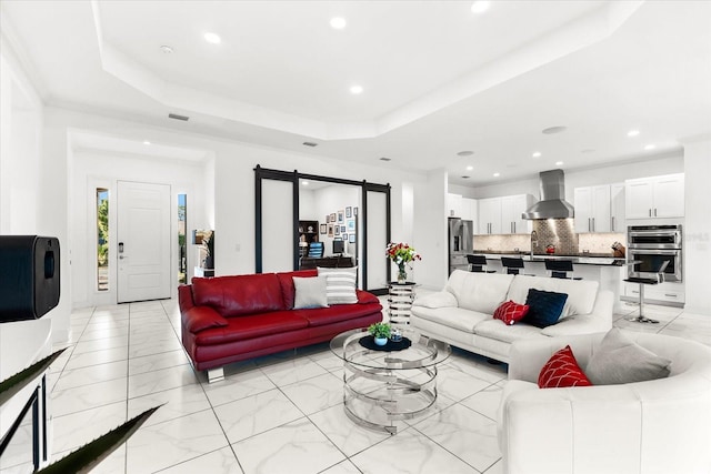 329 Myrtle Ave, Nokomis, FL 34275 - living room with recessed lighting, light marble finish flooring, and a raised ceiling