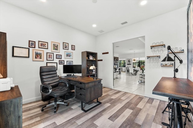 329 Myrtle Ave, Nokomis, FL 34275 - office area featuring recessed lighting, wood finished floors, and baseboards