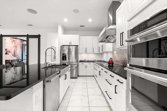 329 Myrtle Ave, Nokomis, FL 34275 - kitchen with appliances with stainless steel finishes, wall chimney range hood, light marble finish floors, crown molding, and a sink