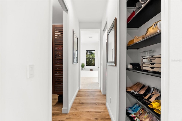 329 Myrtle Ave, Nokomis, FL 34275 - hallway featuring light wood-style flooring and baseboards