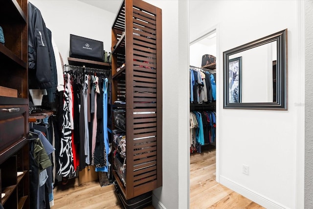 329 Myrtle Ave, Nokomis, FL 34275 - spacious closet featuring wood finished floors