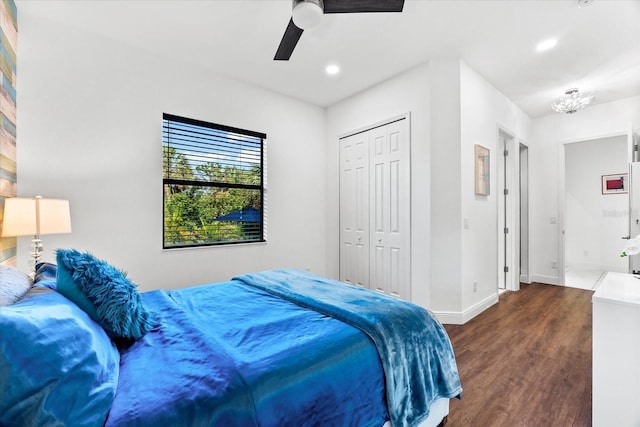 329 Myrtle Ave, Nokomis, FL 34275 - bedroom with dark wood-type flooring, baseboards, a chandelier, a ceiling fan, and recessed lighting