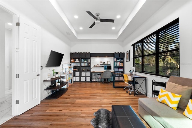 329 Myrtle Ave, Nokomis, FL 34275 - office with ceiling fan, a tray ceiling, recessed lighting, and wood finished floors
