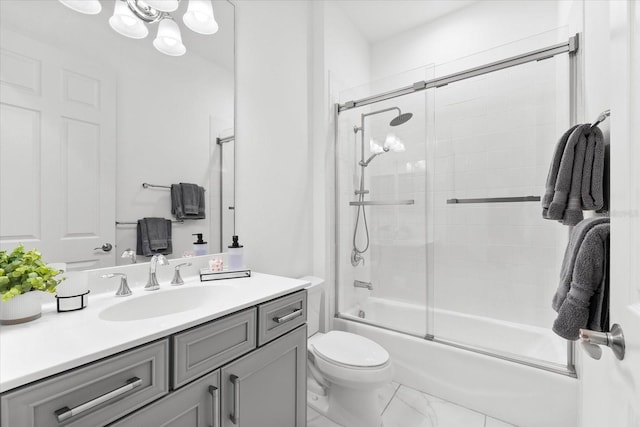 329 Myrtle Ave, Nokomis, FL 34275 - full bath featuring vanity, bath / shower combo with glass door, a chandelier, toilet, and marble finish floors