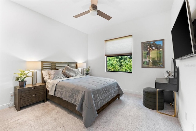 329 Myrtle Ave, Nokomis, FL 34275 - bedroom featuring light carpet, baseboards, and a ceiling fan