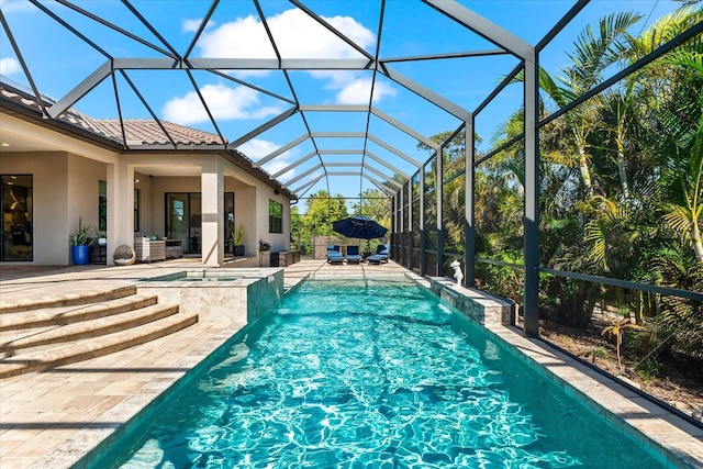 329 Myrtle Ave, Nokomis, FL 34275 - view of pool with a patio area, glass enclosure, a pool with connected hot tub, and outdoor lounge area