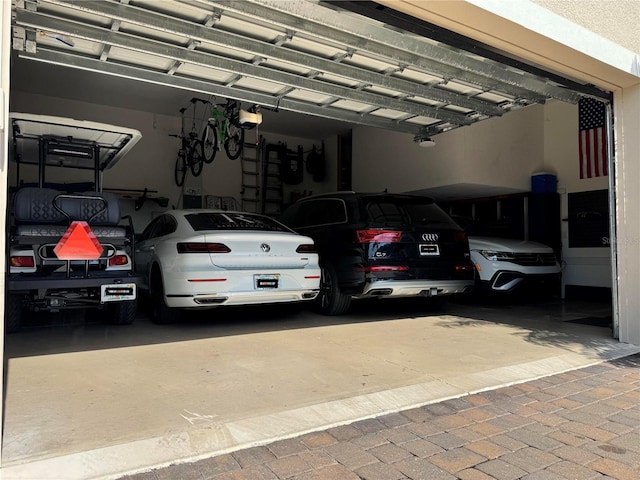 329 Myrtle Ave, Nokomis, FL 34275 - garage featuring a garage door opener