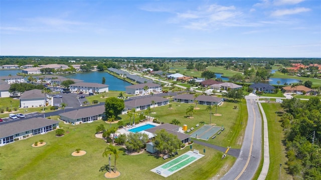 view of property location featuring a large body of water and a pool