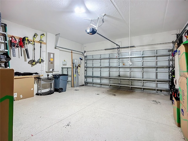 9019 39th Street Cir E, Parrish, FL 34219 - garage featuring electric panel and a garage door opener