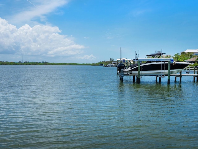 3516 Casey Key Rd, Nokomis, FL 34275 - dock featuring boat lift and a water view