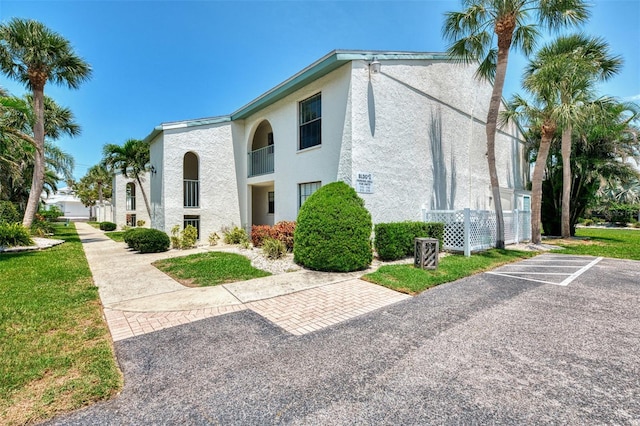 1730 Manasota Beach Rd Unit 215, Englewood, FL 34223 - view of home's exterior featuring stucco siding