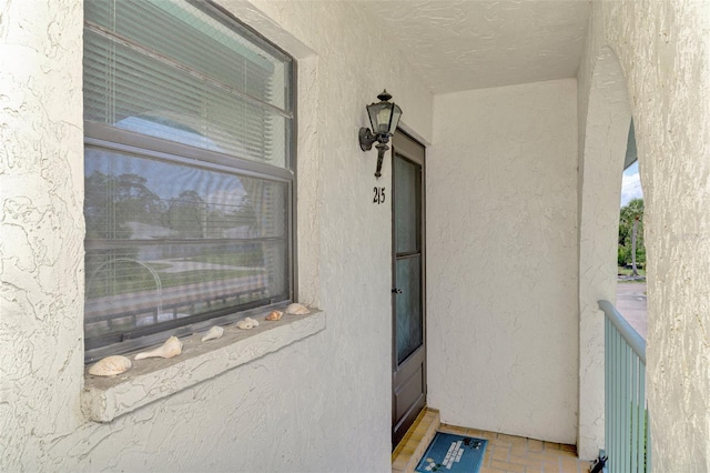 1730 Manasota Beach Rd Unit 215, Englewood, FL 34223 - property entrance with stucco siding