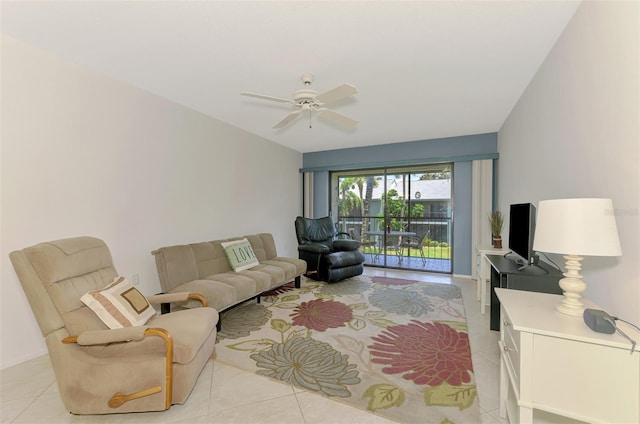 1730 Manasota Beach Rd Unit 215, Englewood, FL 34223 - living area with light tile patterned floors and a ceiling fan