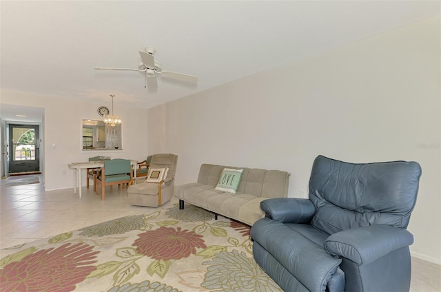 1730 Manasota Beach Rd Unit 215, Englewood, FL 34223 - living area with a chandelier, light tile patterned flooring, a ceiling fan, and baseboards