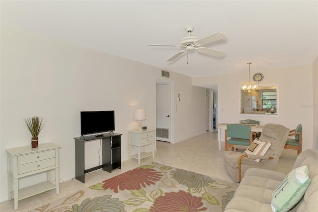 1730 Manasota Beach Rd Unit 215, Englewood, FL 34223 - living room featuring a ceiling fan, a chandelier, and light tile patterned flooring
