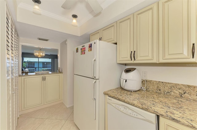 1730 Manasota Beach Rd Unit 215, Englewood, FL 34223 - kitchen with cream cabinets, white appliances, a chandelier, light tile patterned flooring, and light stone countertops