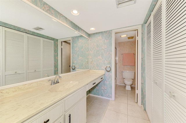 1730 Manasota Beach Rd Unit 215, Englewood, FL 34223 - full bath with a closet, tile patterned flooring, vanity, baseboards, and wallpapered walls