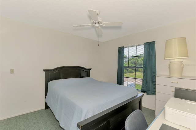 1730 Manasota Beach Rd Unit 215, Englewood, FL 34223 - carpeted bedroom featuring baseboards and a ceiling fan
