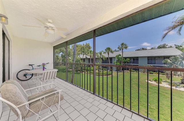 1730 Manasota Beach Rd Unit 215, Englewood, FL 34223 - sunroom with ceiling fan