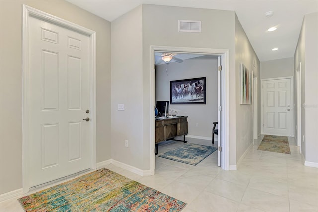 20636 Swallowtail Ct, Venice, FL 34293 - entryway with ceiling fan, baseboards, light tile patterned floors, and recessed lighting