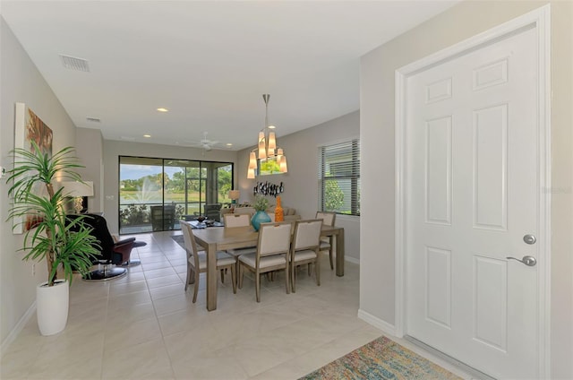 20636 Swallowtail Ct, Venice, FL 34293 - dining space featuring a ceiling fan, baseboards, light tile patterned flooring, and recessed lighting
