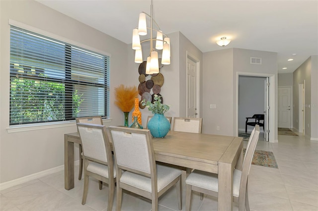 20636 Swallowtail Ct, Venice, FL 34293 - dining area featuring light tile patterned floors, a chandelier, baseboards, and recessed lighting