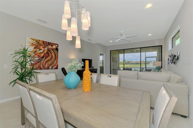 20636 Swallowtail Ct, Venice, FL 34293 - dining space with baseboards, ceiling fan, recessed lighting, and a chandelier