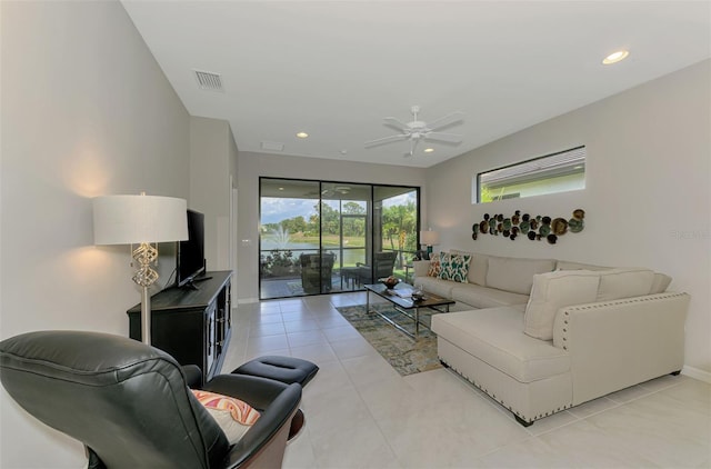 20636 Swallowtail Ct, Venice, FL 34293 - living area featuring ceiling fan, light tile patterned flooring, recessed lighting, and baseboards