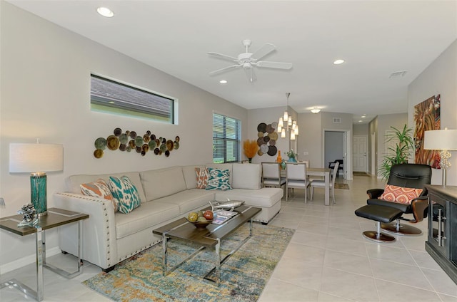 20636 Swallowtail Ct, Venice, FL 34293 - living area featuring ceiling fan, light tile patterned floors, recessed lighting, a chandelier, and baseboards