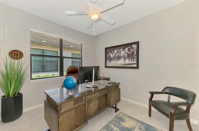 20636 Swallowtail Ct, Venice, FL 34293 - home office with baseboards, ceiling fan, and light tile patterned flooring