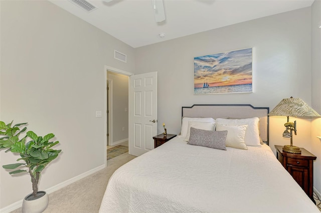 20636 Swallowtail Ct, Venice, FL 34293 - bedroom with light carpet, baseboards, and a ceiling fan