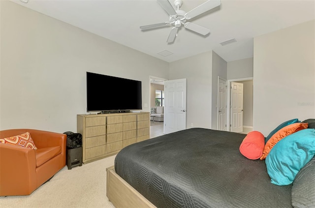 20636 Swallowtail Ct, Venice, FL 34293 - bedroom with light carpet and a ceiling fan