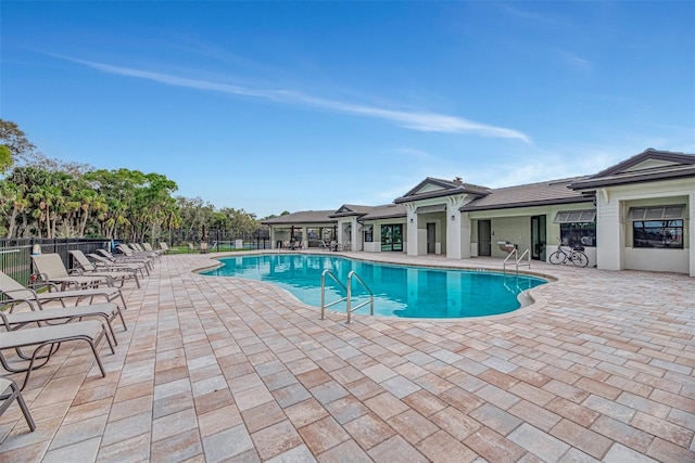 20636 Swallowtail Ct, Venice, FL 34293 - community pool featuring fence and a patio area